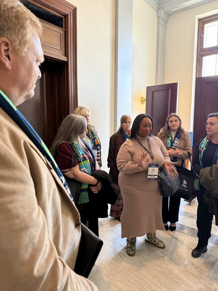 Tiffany speaking to legislative aids